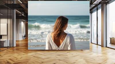 Attractive woman romantic portrait on sea background. Wall mural