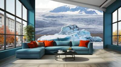 Eisberg in lagoon with glacier background, Iceland Wall mural