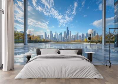 modern city skyline with reflections on plaza under clear blue sky Wall mural