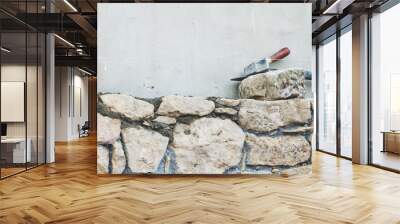 stone wall under construction on a renovation project Wall mural