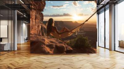 Woman Relaxing in Hammock Overlooking Canyon at Sunset Wall mural