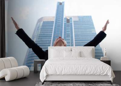 Businesswoman Raising Arms at Skyscraper Wall mural