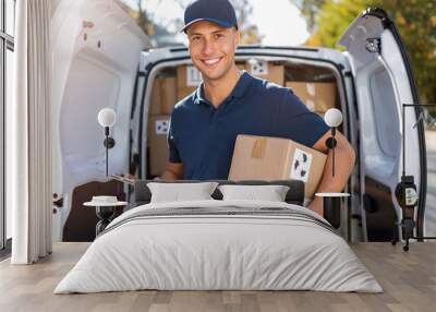 Delivery man standing in front of his van Wall mural