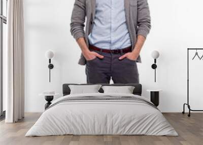 Full length portrait of young man standing on white background Wall mural