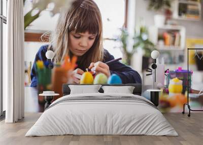 Girl painting easter eggs 
 Wall mural