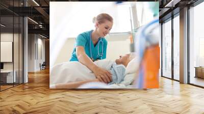 Senior patient and nurse in hospital Wall mural