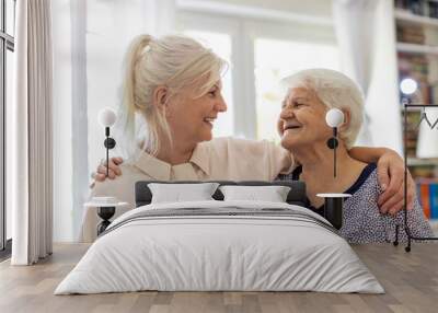 Woman spending time with her elderly mother

 Wall mural