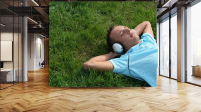 young man listening to music Wall mural