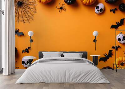 Halloween background with spooky elements on orange paper, flat lay top view, frame border with copy space for text and design. Halloween party concept with black spider web decoration, bats, eyes Wall mural