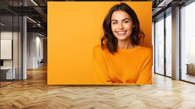 autumn banner with cute smiling model woman against orange background. thanksgiving banner with copy space Wall mural