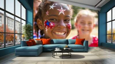 A young girl with stars and stripes face paint smiles brightly, surrounded by friends.  Joyful celebration of patriotism and unity. Wall mural