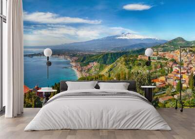 Aquamarine blue waters of sea near Taormina resorts and Etna volcano mount Wall mural