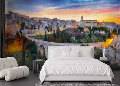 Gravina in Puglia ancient town, bridge and canyon at sunrise. Panoramic view of old city Gravina in Puglia, Apulia, Italy. Europe Wall mural