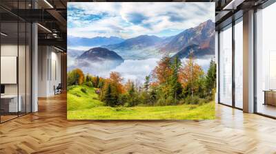 Outstanding autumn view on suburb of Stansstad city  and Lucerne lake with mountaines and fog. Wall mural