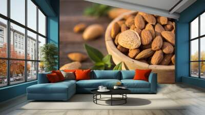 Fresh almonds in the wooden bowl Wall mural