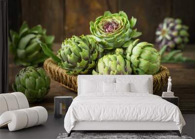 Fresh and raw artichoke on the wooden table Wall mural