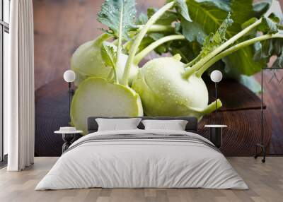 Fresh kohlrabi on the wooden table closeup Wall mural