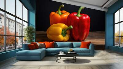 Fresh tricolor bell peppers on the table close up Wall mural