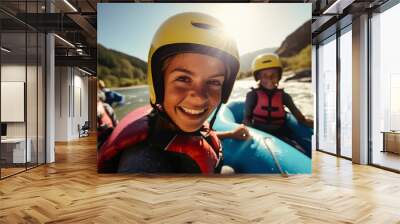 Portrait of a group of happy young people rafting. Extreme sport Wall mural