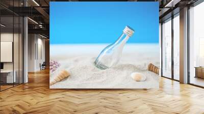 bottle over tropical sand beach with clear blue sky, background for love travel on vacation summer concept. Wall mural