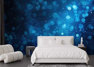 Abstract blue blurry unfocused sparkle glitter blue bokeh background wallpaper with copy space. Blue Christmas glitter design background. Wall mural