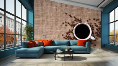 cup of coffee and coffee beans on jute Wall mural