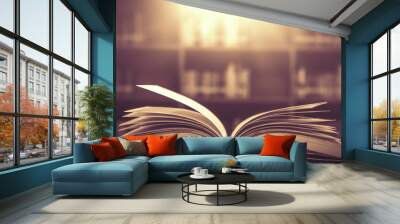 Abstract gold magic book on wooden background Wall mural