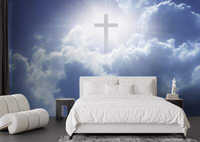 christian cross appeared bright in the sky with soft fluffy clouds, white, beautiful colors. with th Wall mural