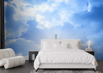 Christian cross appeared bright in the sky with soft fluffy clouds, white, beautiful colors. With the light shining as hope, love and freedom in the sky background Wall mural