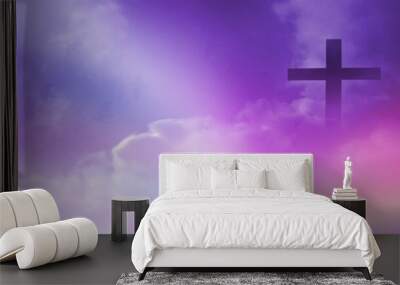 Christian cross appeared bright in the sky with soft fluffy clouds, white, beautiful colors. With the light shining as hope, love and freedom in the sky background Wall mural