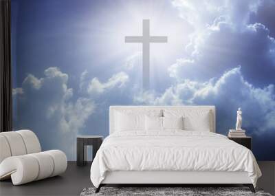 Christian cross appeared bright in the sky with soft fluffy clouds, white, beautiful colors. With the light shining as hope, love and freedom in the sky background Wall mural