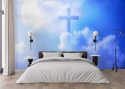 Christian cross appeared bright in the sky with soft fluffy clouds, white, beautiful colors. With the light shining as hope, love and freedom in the sky background Wall mural