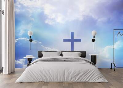 Christian cross appeared bright in the sky with soft fluffy clouds, white, beautiful colors. With the light shining as hope, love and freedom in the sky background Wall mural