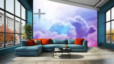 Christian cross appeared bright in the sky with soft fluffy clouds, white, beautiful colors. With the light shining as hope, love and freedom in the sky background Wall mural