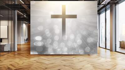 The Christian cross looks bright in soft white and the glittering bokeh background is the light of hope and leads to heaven. Wall mural