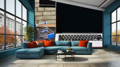 close up of Cart on keyboard computer with tablet background Wall mural