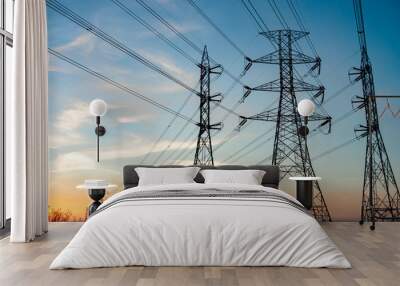 silhouette high voltage pole on sky sunset background. Wall mural