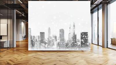 A stunning winter city skyline, shrouded in a soft blanket of snow, showcasing modern architecture and a serene atmosphere. Wall mural