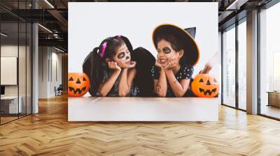 Happy asian little child girl in costumes and makeup having fun on Halloween celebration Wall mural