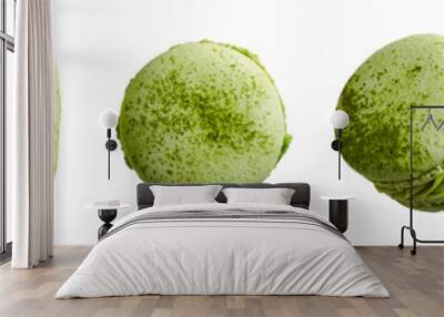 Traditional french cookie macaron green light with flavor lemongrass and matcha isolated on white background. Sweet cookies macaron in different camera angles. Wall mural