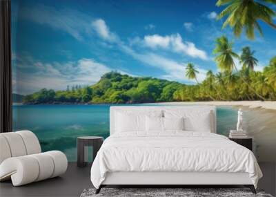 A panoramic view of a tropical beach with turquoise waters and palm trees  Wall mural