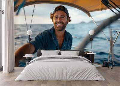 A happy sailor posing on a boat, dressed in nautical attire, with a beaming smile as he gazes into the open sea Wall mural