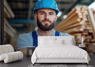 A sturdy bearded man wearing a blue helmet and gray shirt stands with arms crossed, exuding strength, reliability, and a modern industrial feel. Wall mural