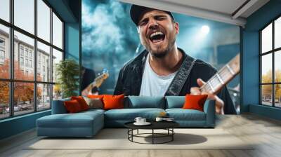 This image shows a passionate guitarist playing an electric guitar on stage in a live music setting, emphasizing energy, talent, musical expression, and the vibrant concert atmosphere. Wall mural