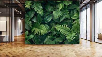 Green leaves of various plants with a dark background. Wall mural