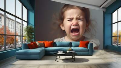 closeup photo of a cute little baby girl child crying and screaming isolated, childhood, unhappy, emotion, sad, sadness, pain. Wall mural