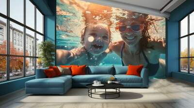 Cute smiling baby and mom having fun swimming and diving in the pool at the resort on summer vacation. Activities and sports to happy kid, family, holiday, Wall mural