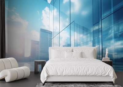 Modern office building or business center. High-rise window buildings made of glass reflect the clouds and the sunlight. empty street outside  wall modernity civilization. growing up business Wall mural