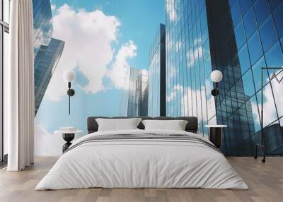 Modern office building or business center. High-rise window buildings made of glass reflect the clouds and the sunlight. empty street outside  wall modernity civilization. growing up business Wall mural