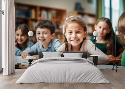 primary elementary school group of children studying in the classroom. learning and sitting at the desk. young cute kids smiling, Wall mural